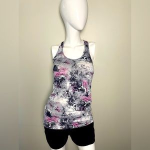 Lululemon Cool Razorback tank size 6/8 in a pink, black and gray flower print